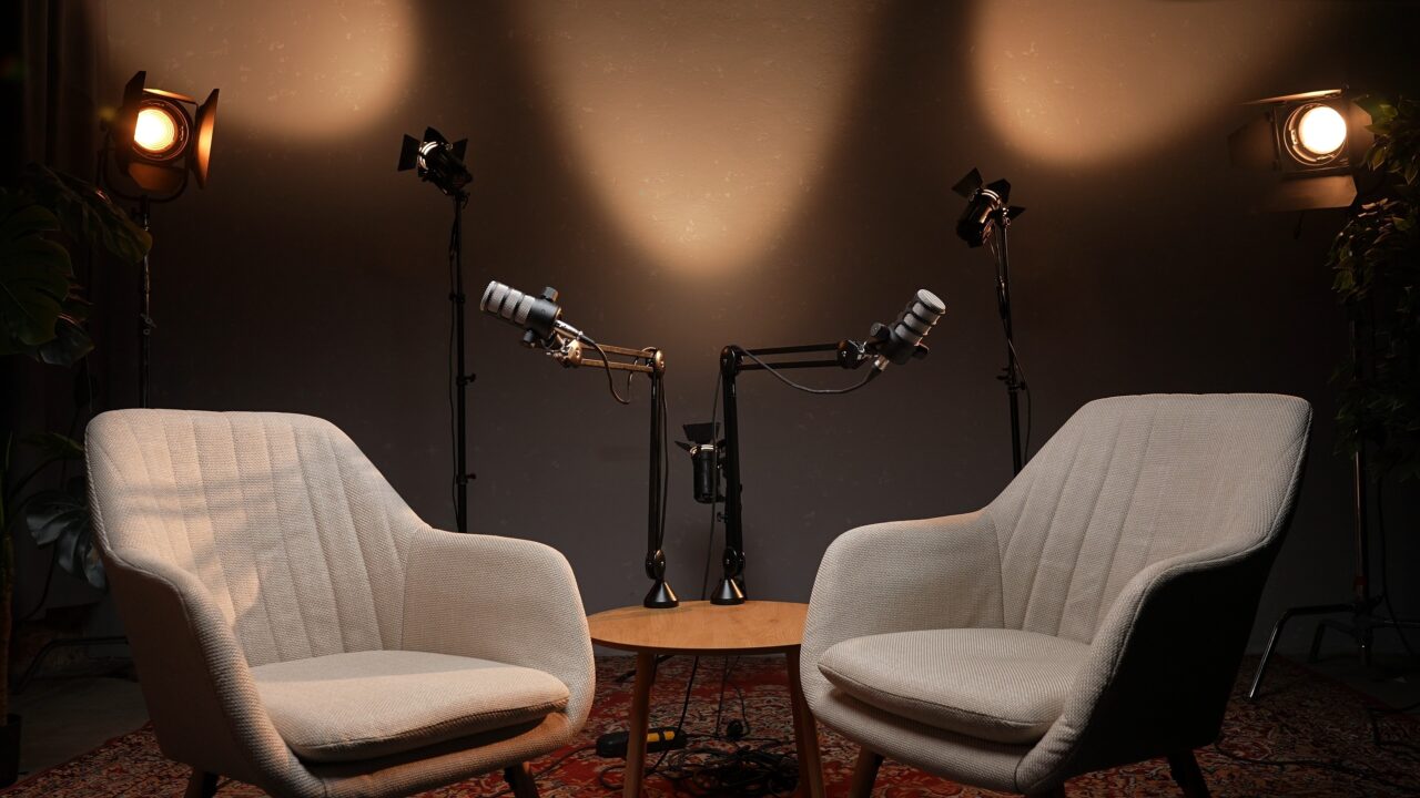 Creative,storytelling,unfolds,in,a,cozy,podcast,studio,with,warm